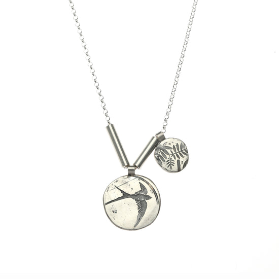 Two circle silver swallow and leaves necklace