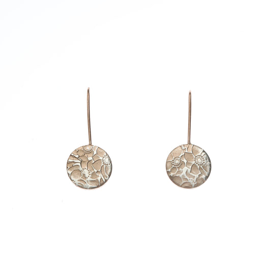 Small silver flower print earrings with rose gold
