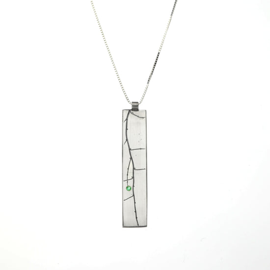 Branch pendant with emerald